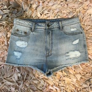 UO BDG Distress High Rise Cheeky Distressed Shorts